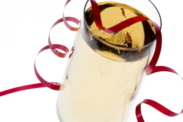 Champagne glass with a ribbon on it — Stock Photo, Image