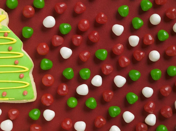 Christmas tree biscuit and candies — Stock Photo, Image