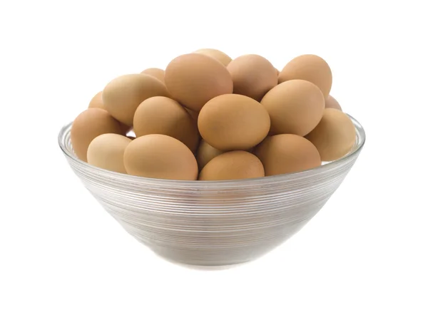 Tazón transparente lleno de huevo marrón —  Fotos de Stock