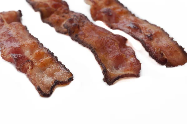 Närbild på kokta bacon — Stockfoto