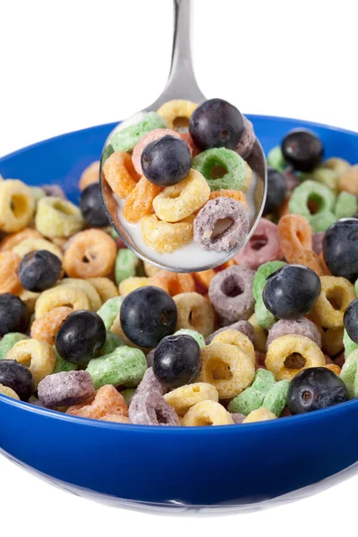 Colorful cereal with blueberries and milk — Stock Photo, Image