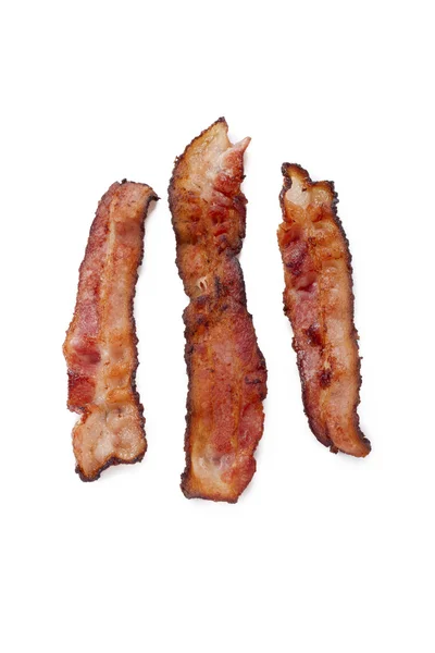 Crispy bacon on white — Stock Photo, Image