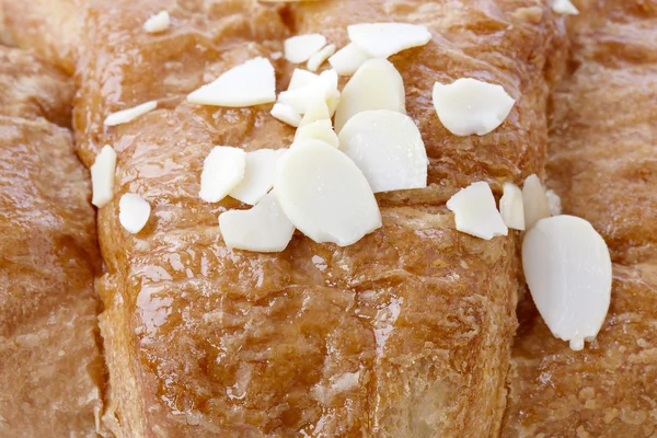 Croissant e amêndoa — Fotografia de Stock