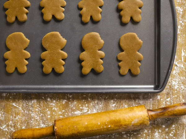 Gingerbread cookies and rolling pin — Stock Photo, Image
