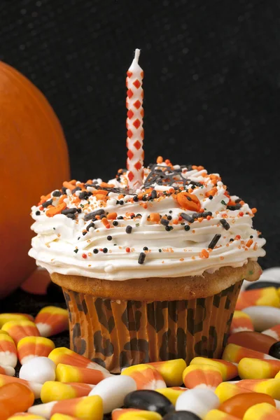 Halloween cupcake with candle — Stock Photo, Image