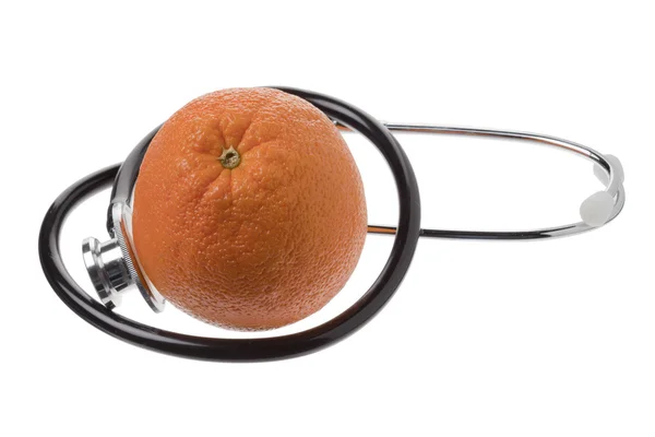 Оранжевый и стетоскоп — стоковое фото