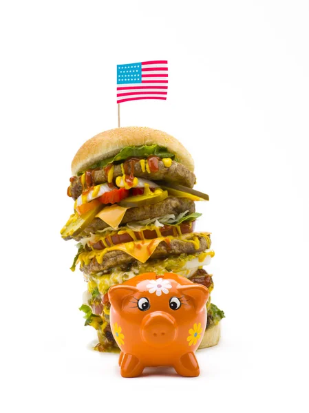 Imponente hambúrguer e porquinho banco — Fotografia de Stock
