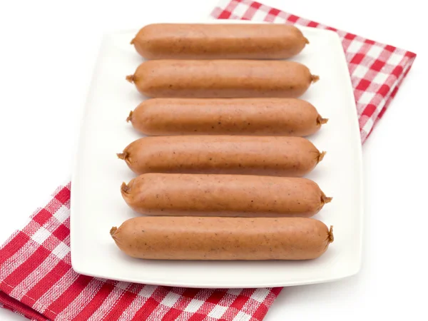 Ongekookt hotdogs op een plaat — Stockfoto