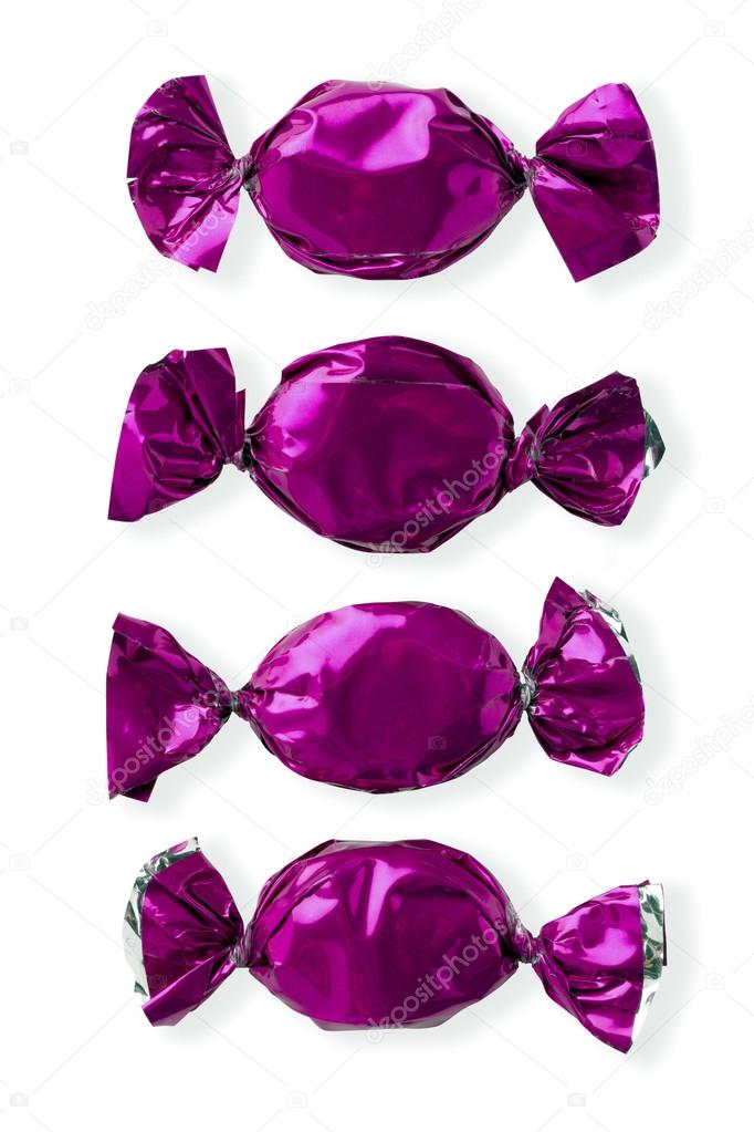View of purple shiny candies arranged side by side