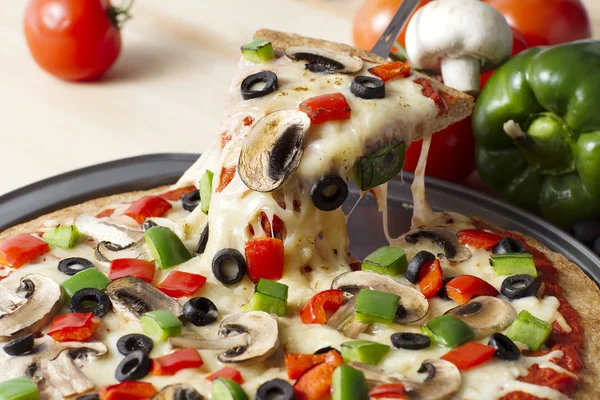 Melted pizza on the pan — Stock Photo, Image