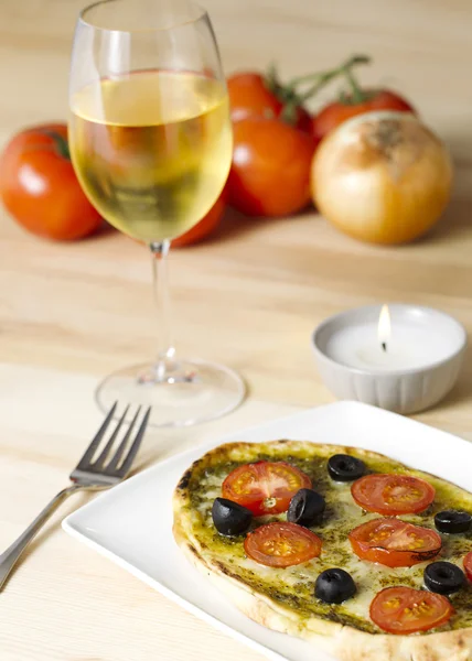 Pizza with glass of wine — Stock Photo, Image