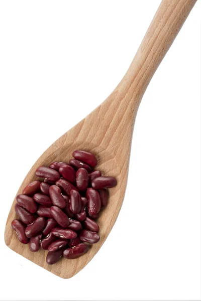 Red beans on wooden spatula — Stock Photo, Image