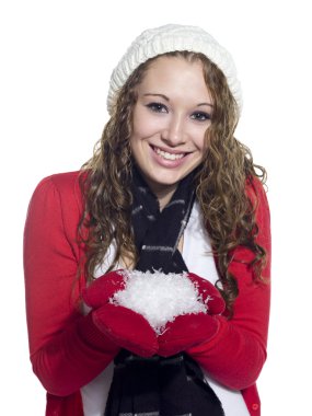 smiling young woman with snow in her hands clipart