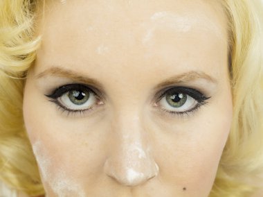 cropped image of a womans face with flour on her face clipart