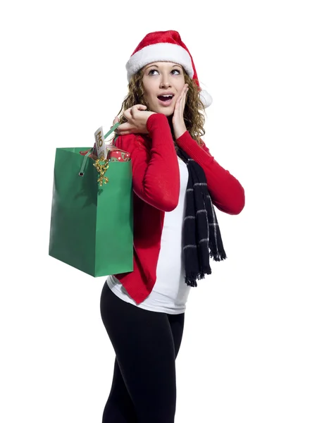 Mujer joven sorprendida sosteniendo bolsa de compras —  Fotos de Stock