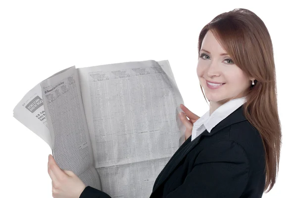 Uma mulher de negócios feliz lendo jornal — Fotografia de Stock