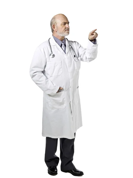 A male doctor pointing to the side — Stock Photo, Image