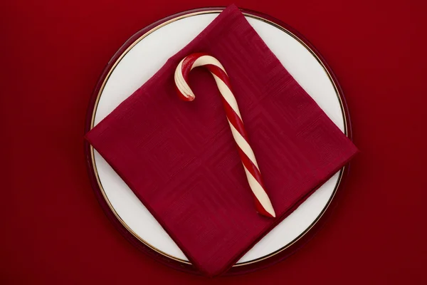 Candy cane on red background — Stockfoto