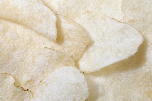 Кучу соленых картофельных чипсов — стоковое фото