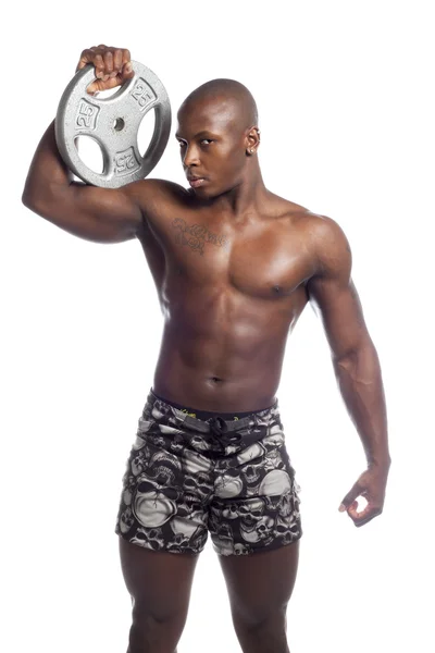 African american wrestler holding weight disc — Stock Photo, Image