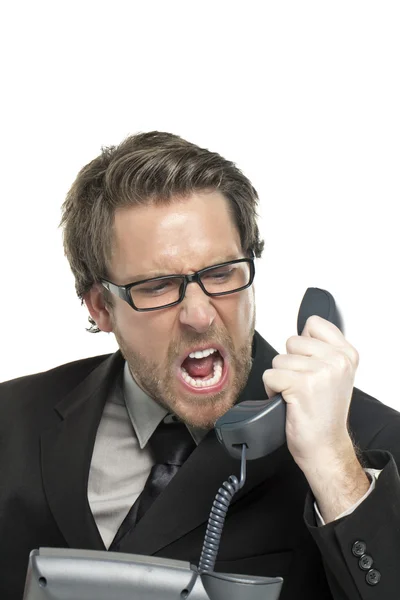 Wütender Geschäftsmann schreit am Telefon — Stockfoto