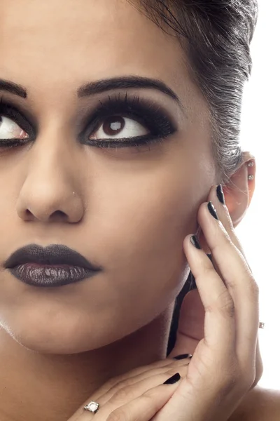 Close up of a young indian female fashion model looking away — Stock Photo, Image