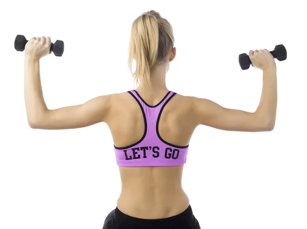 Rear view of a female with dumbbells — Stock Photo, Image