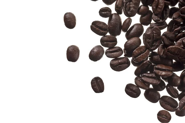 Close up shot of coffee beans on white background — Stock Photo, Image