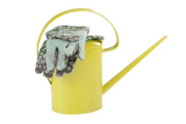 Gardening gloves and watering can — Stock Photo, Image