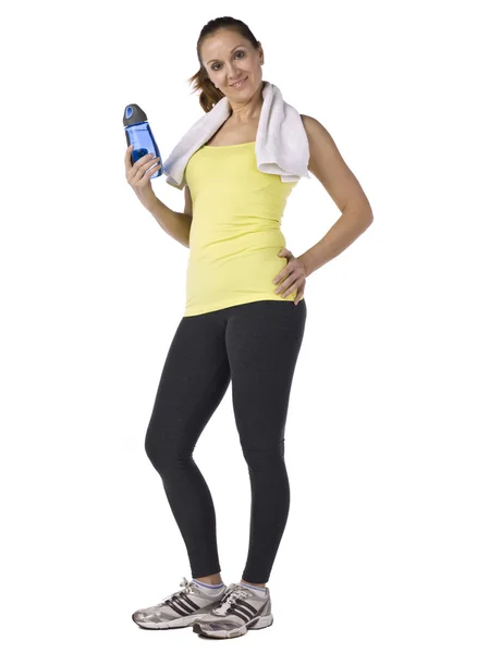 Sporty woman holding water jug — Stock Photo, Image