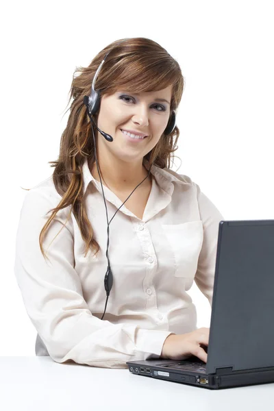 Operador de telefonía de apoyo con auriculares y portátil —  Fotos de Stock