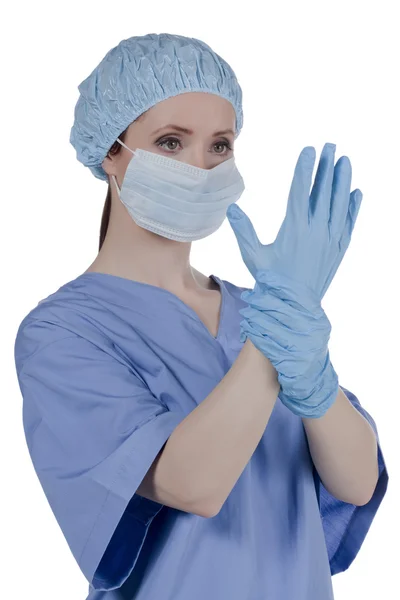Female doctor wearing mask and gloves Stock Picture
