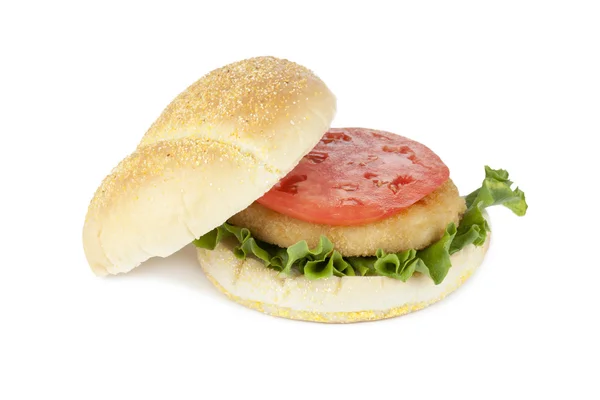 Chicken hamburger with slice tomato and lettuce leaf — Stock Photo, Image