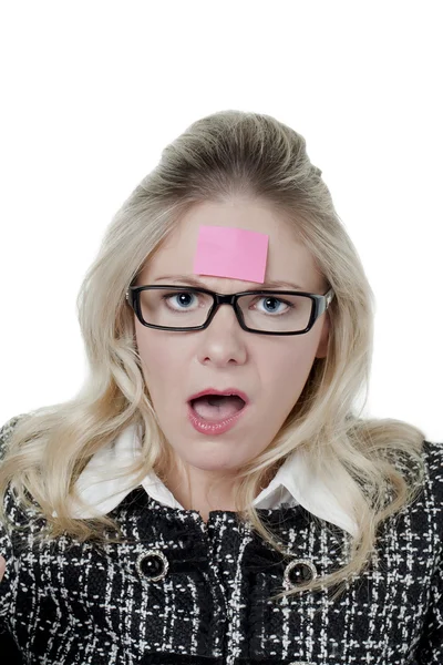 Woman with sticky note on her forehead — Stock Photo, Image