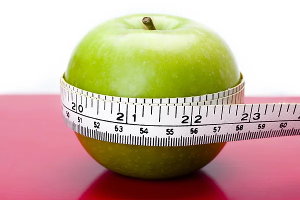 Apple on a table — Stock Photo, Image