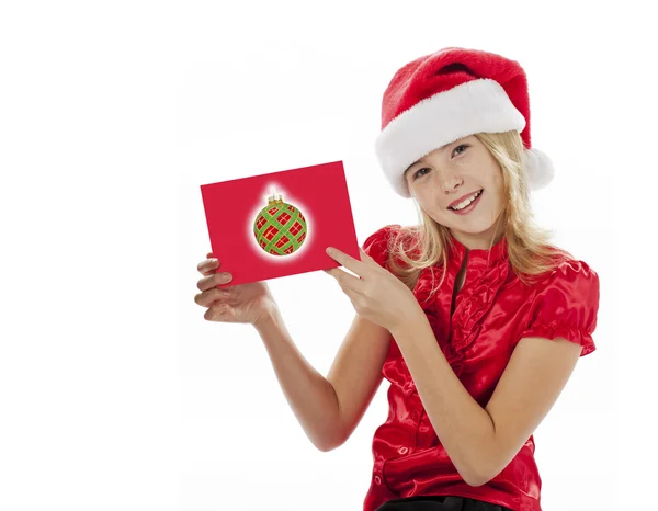 Beautiful girl holding a christmas greeting card — Stock Photo, Image