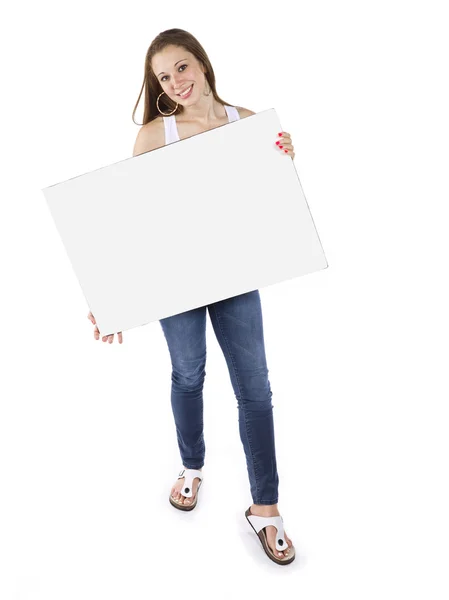 Beautiful teenager holding an empty billboard — Stock Photo, Image