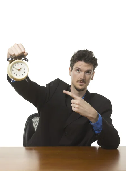 Businessman showing alarm clock — Stock Photo, Image