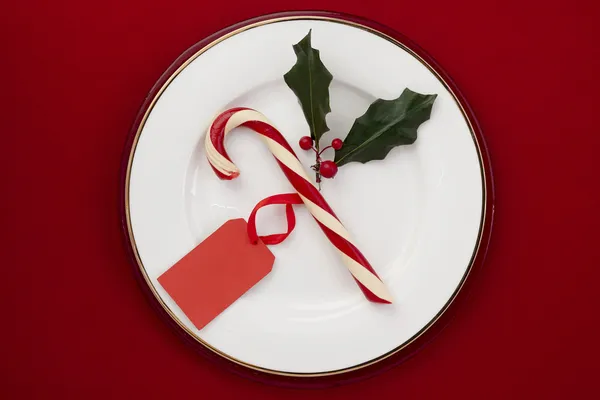 A Cukorpálca egy tányérra piros címkével — Stock Fotó