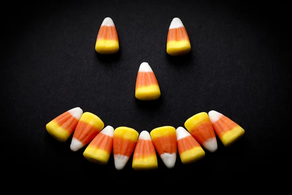 Candy corn glimlachen gezicht — Stockfoto