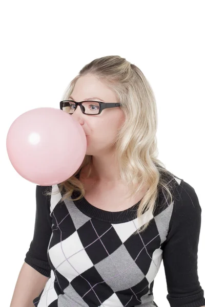 Blond woman blowing bubble gum — Stock Photo, Image