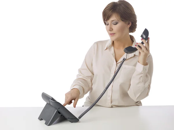 Business woman dialing the telephone — стоковое фото