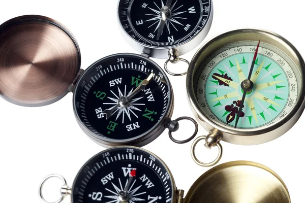 Cropped image of three compass — Stock Photo, Image