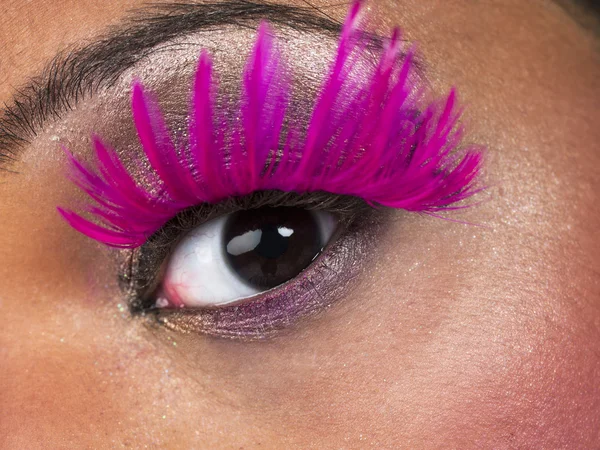 Close up shot of human eye with false eyelashes — Stock Photo, Image