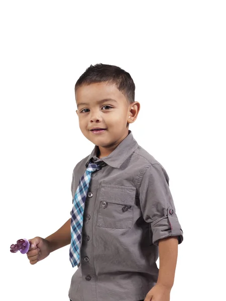 Menino segurando uma flor — Fotografia de Stock