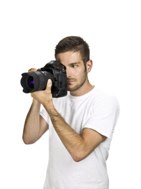 Fotoğraf makinesi tutan bir fotoğrafçı.