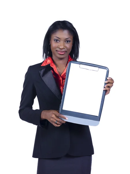 Smiling young businesswoman holding clipboard — Stock Photo, Image