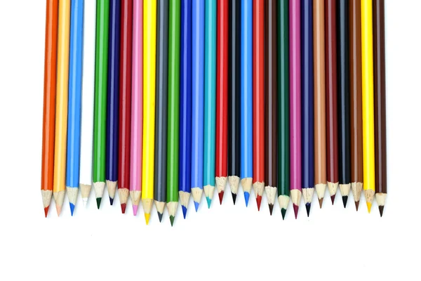 View of colored pencil arranged orderly over white background — Stock Photo, Image