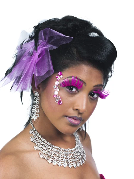 Portrait shot of a young beautiful female wearing stage make up — Stock Photo, Image