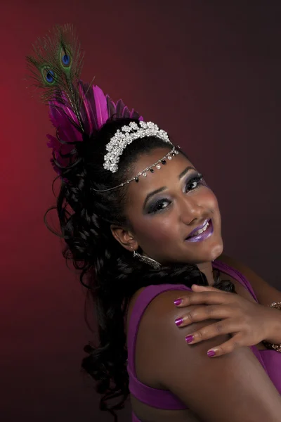 Portrait of a young female in stage make up posing with hand on — Stock Photo, Image